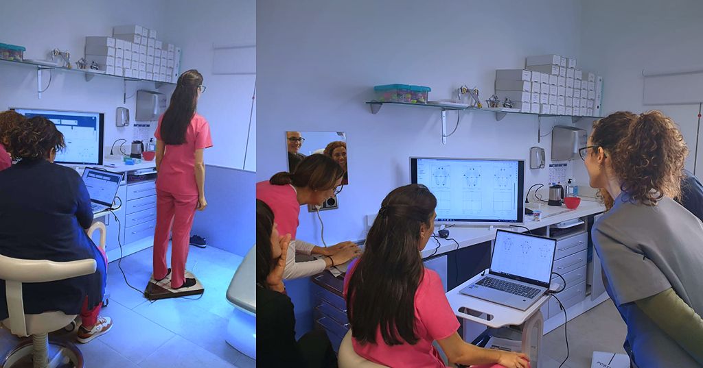Clinicians running Posturometer measurements in a blue-lit clinic testing room, screens showing live posture readings.